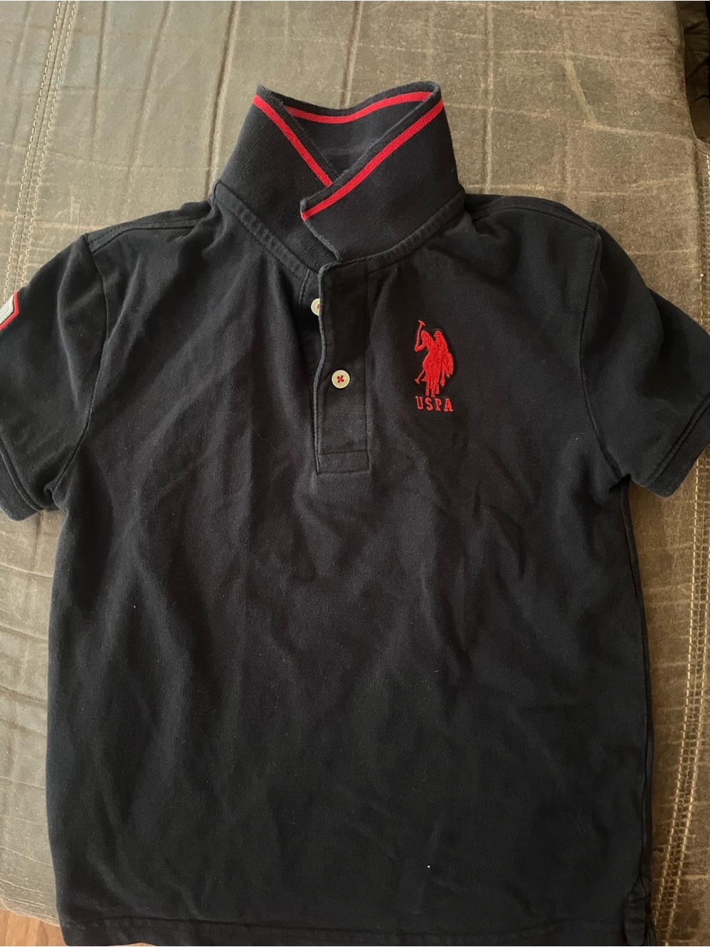 U.S. Polo Assn. Kids Black Polo with Red Logo Trim
